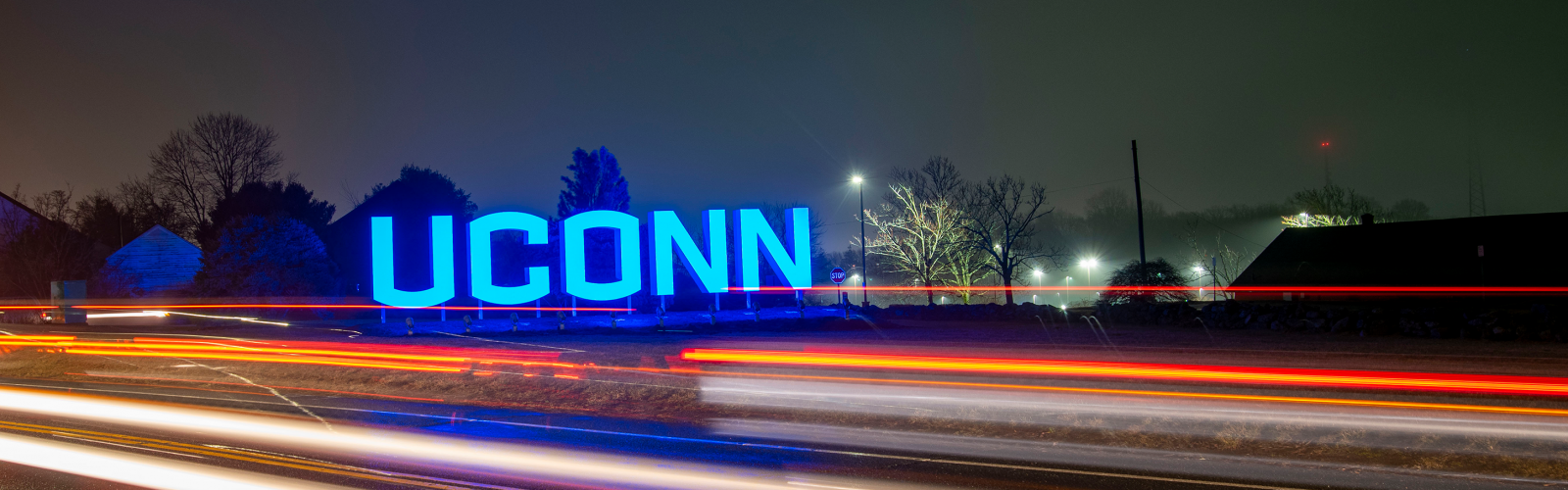UConn sign at night